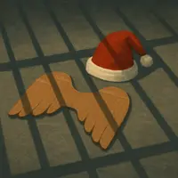 Cardboard angel wings and a red Santa hat on a concrete floor, crossed by shadows resembling prison bars.